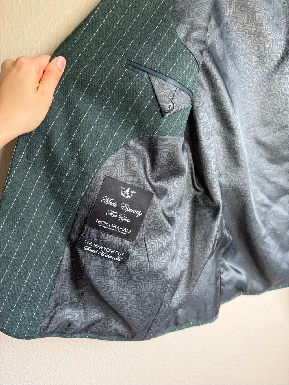 Nick Graham green pinstripe suit blazer